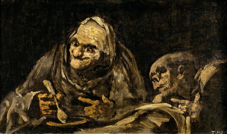 two old men eating soup
