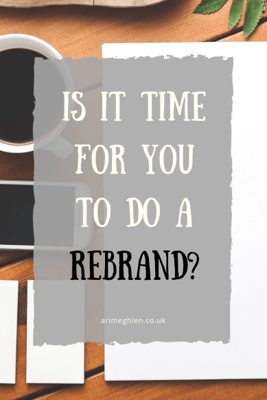 Title Image: Is it time for you to do a rebrand. Image: Desk with paper, coffee, phone and business cards