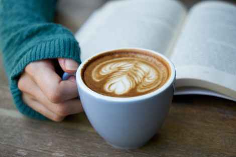 Image of a book and a coffee.
